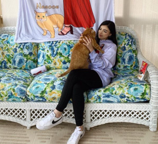 Illustration de l'article : Cette chatte déteste tout son entourage à part son grand-père